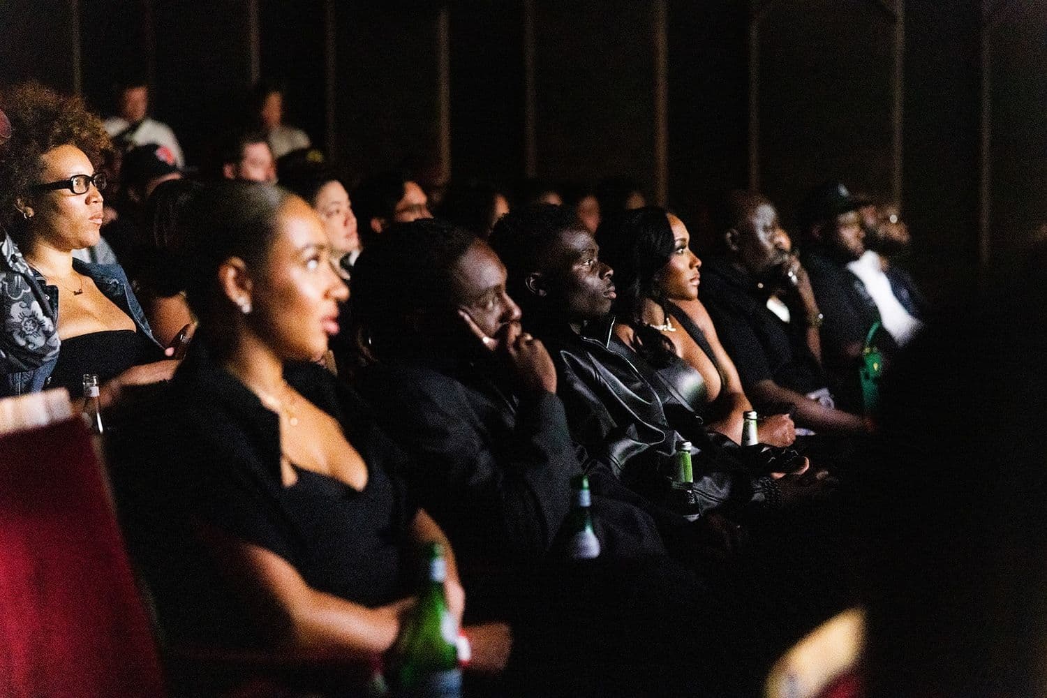 group of people watching film premiere
